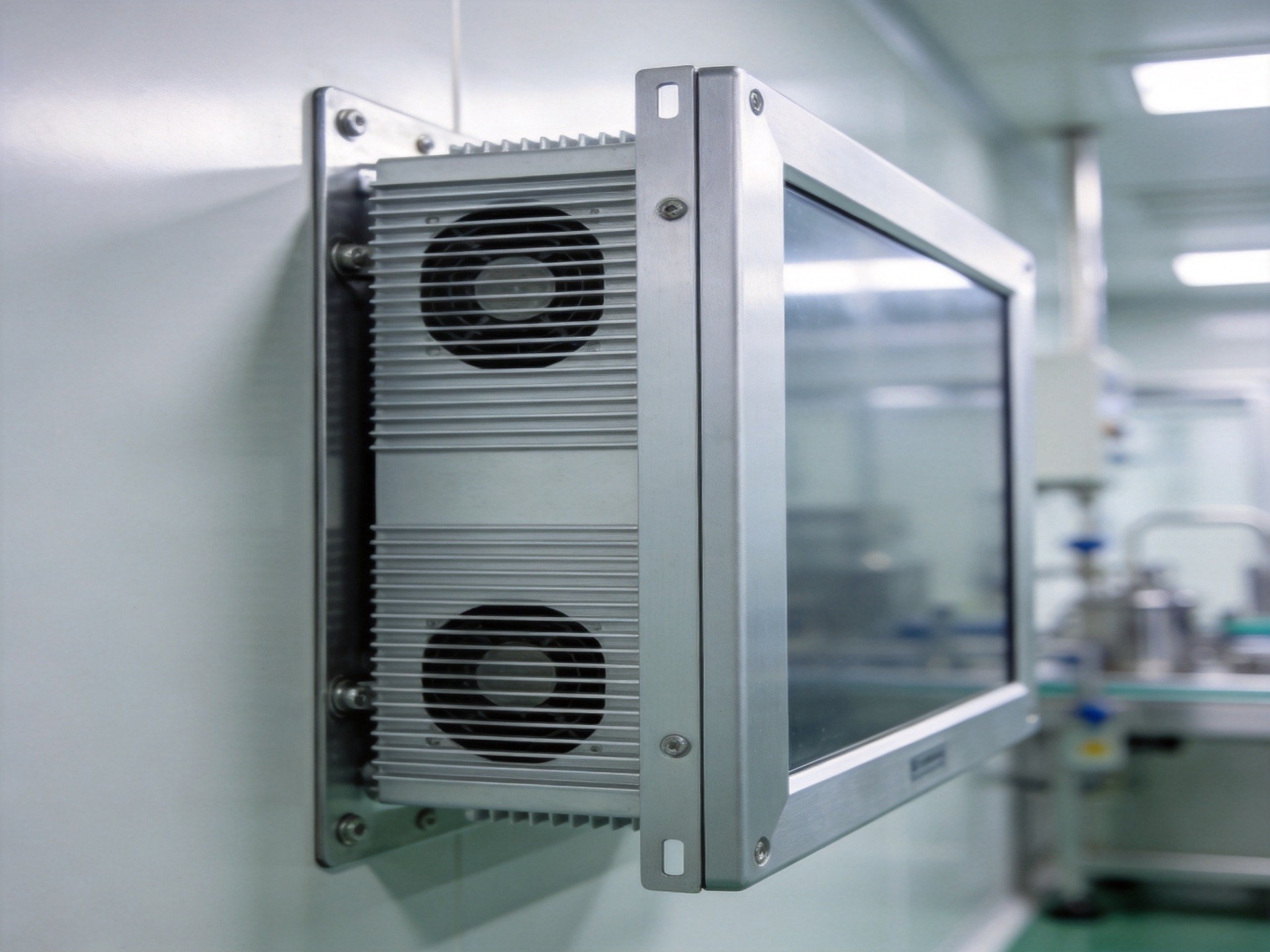 Close-up of fanless industrial PC aluminum heatsink chassis with passive cooling fins