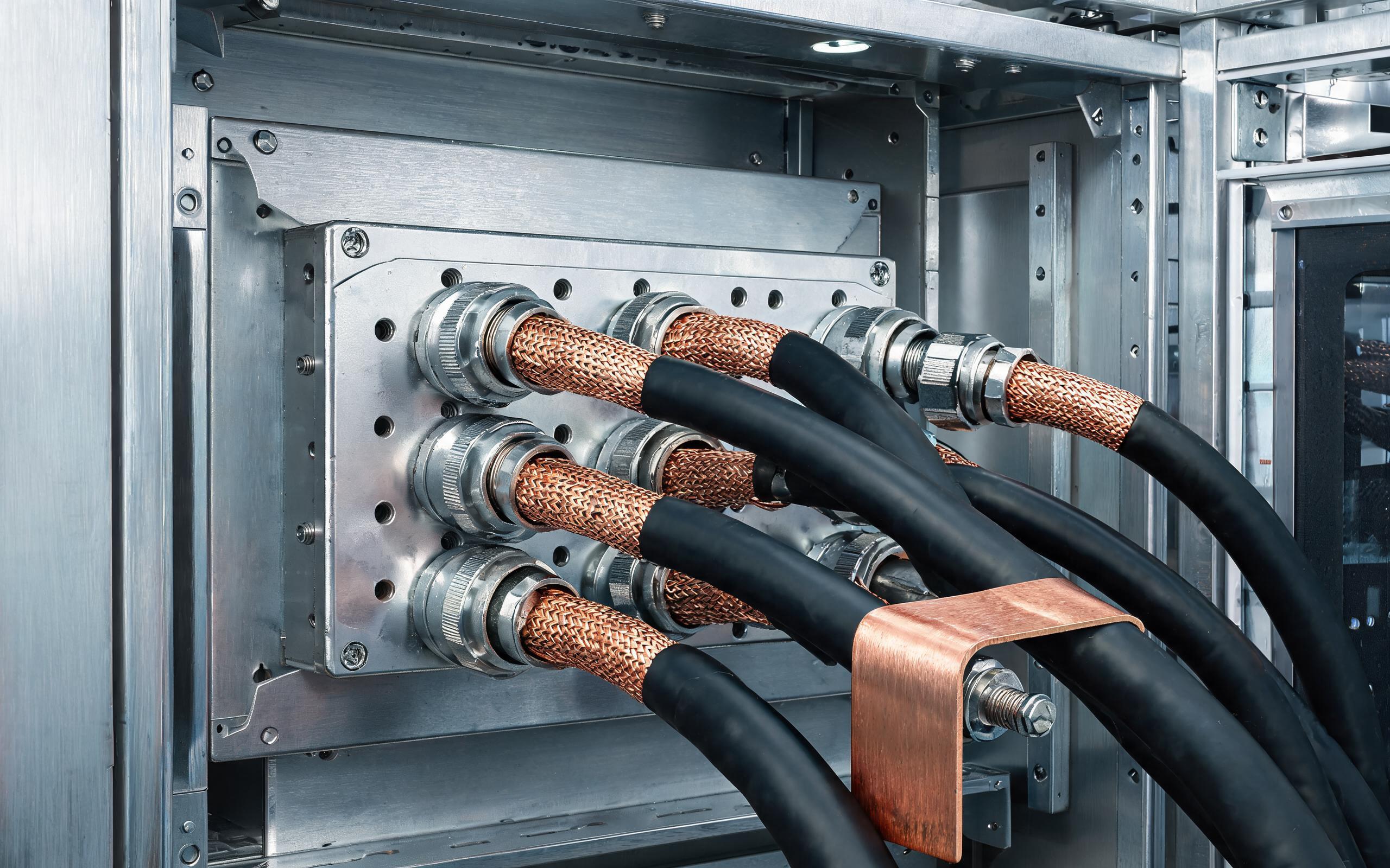 Shielded Cable Entry and Chassis Bonding shielded cable entry and grounding strap on embedded industrial pc I/O panel