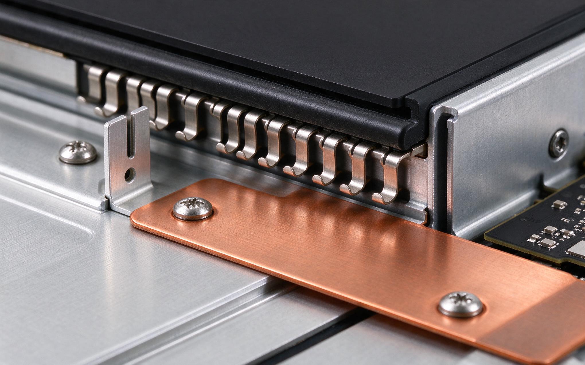 Conductive EMC gasket and bonding strap on a rugged touch screen display bezel